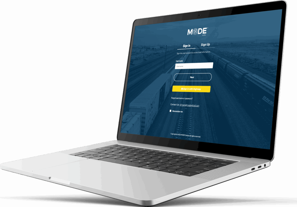 Laptop displaying the MODE Global platform sign-in screen