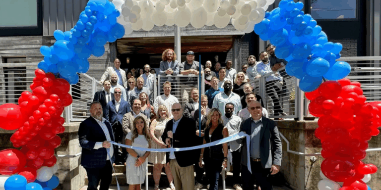 avenger team celebrating brand opening and ribbon cutting ceremony