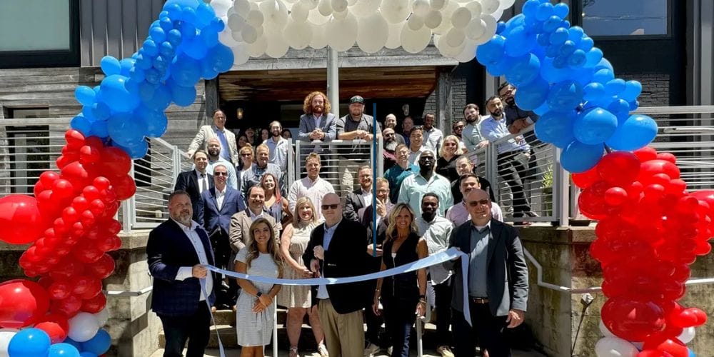 avenger team celebrating brand opening and ribbon cutting ceremony